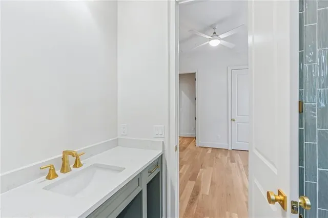a bathroom with a sink and a vanity