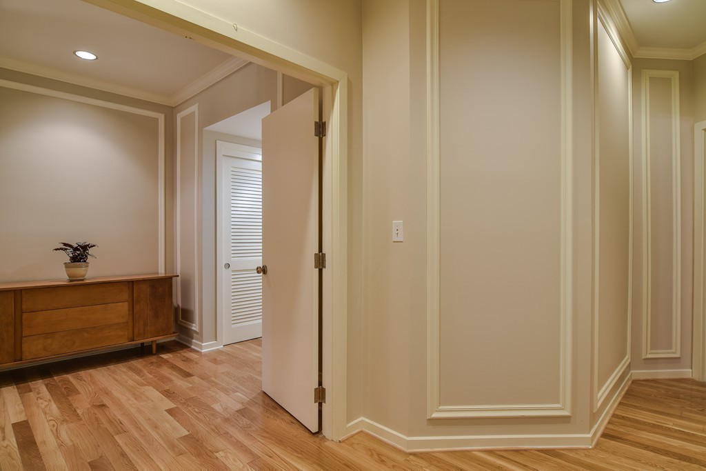 85 Algonquin Road, Unit 85 Chestnut Hill, MA 02467 - Photo 12 of 21 a view of a hallway with wooden floor and closet