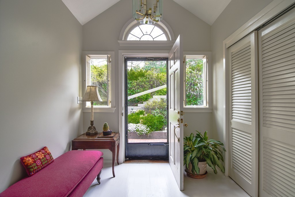 85 Algonquin Road, Unit 85 Chestnut Hill, MA 02467 - Photo 20 of 21 a living room with furniture and a large window