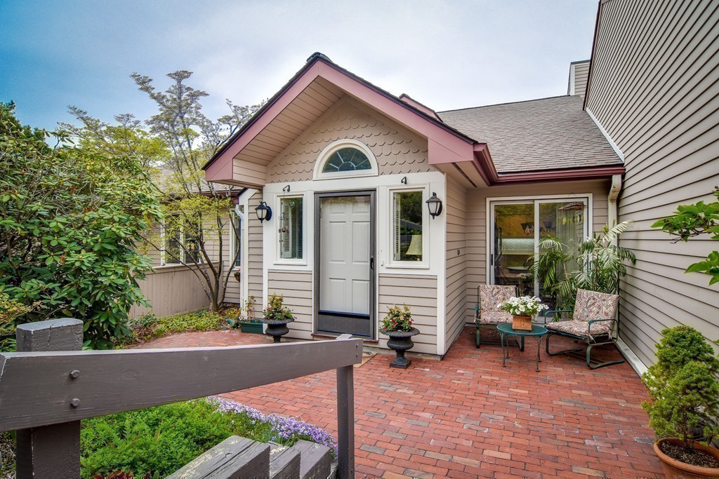 85 Algonquin Road, Unit 85 Chestnut Hill, MA 02467 - Photo 21 of 21 a front view of a house with sitting area