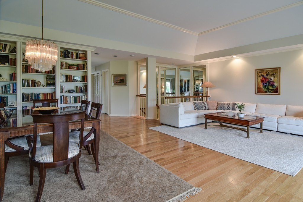 85 Algonquin Road, Unit 85 Chestnut Hill, MA 02467 - Photo 5 of 21 a living room with furniture and a table