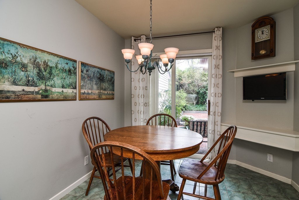 85 Algonquin Road, Unit 85 Chestnut Hill, MA 02467 - Photo 6 of 21 a view of a dining room with furniture window and outside view