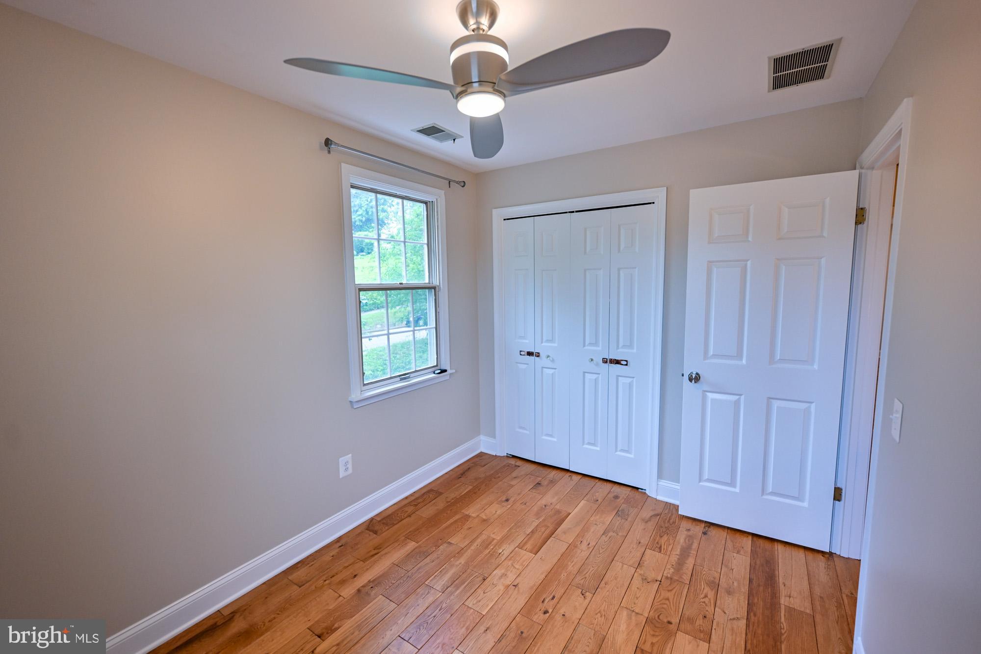 622 Hastings Road Baltimore, MD 21286 - Photo 73 of 87 a view of empty room with wooden floor