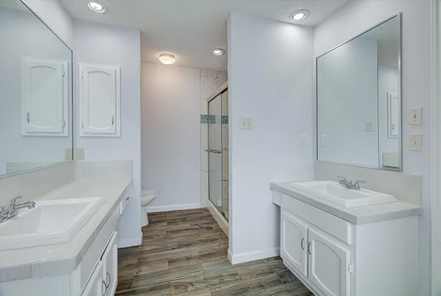 a bathroom with a sink a mirror and a bathtub
