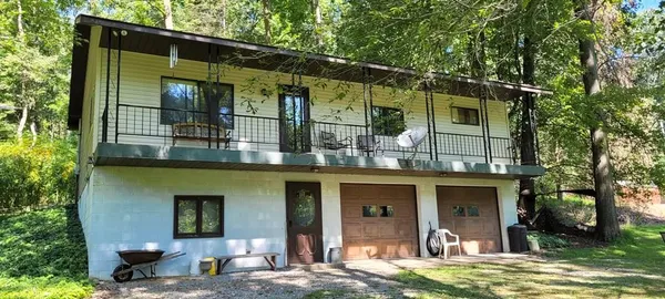 a view of a house with a porch