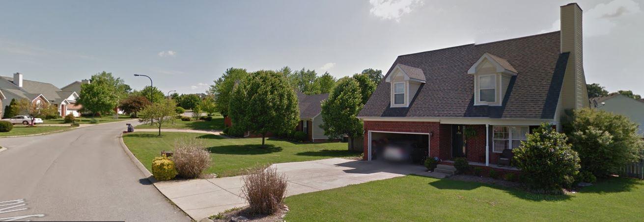 1952 Portway Road Spring Hill, TN 37174 - Photo 11 of 12 a view of a house with backyard and a tree