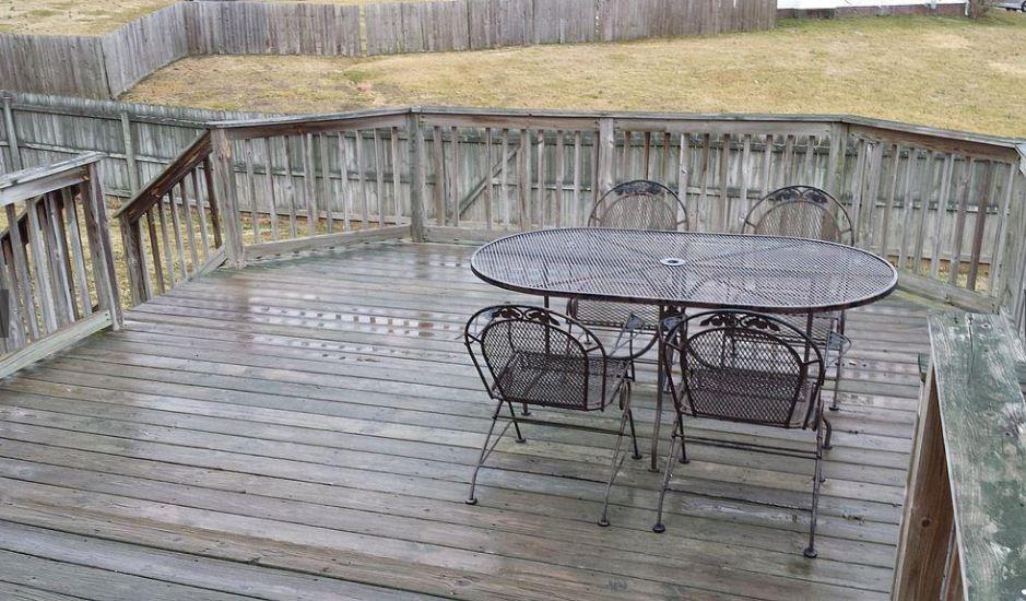 1952 Portway Road Spring Hill, TN 37174 - Photo 6 of 12 a balcony with table and chairs