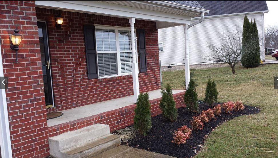 1952 Portway Road Spring Hill, TN 37174 - Photo 8 of 12 a view of a house with a yard