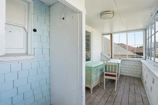 a room with a table and chairs