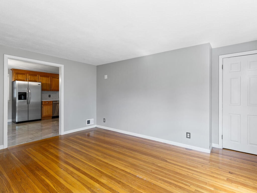 147 Moccasin Drive Warwick, RI 02889 - Photo 13 of 32 View into kitchen from living room--this room could also become a formal dining room