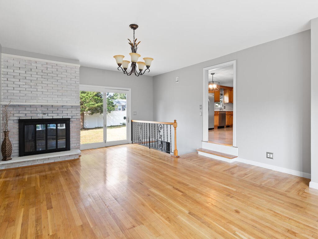 147 Moccasin Drive Warwick, RI 02889 - Photo 5 of 32 View into back porch, basement, and kitchen