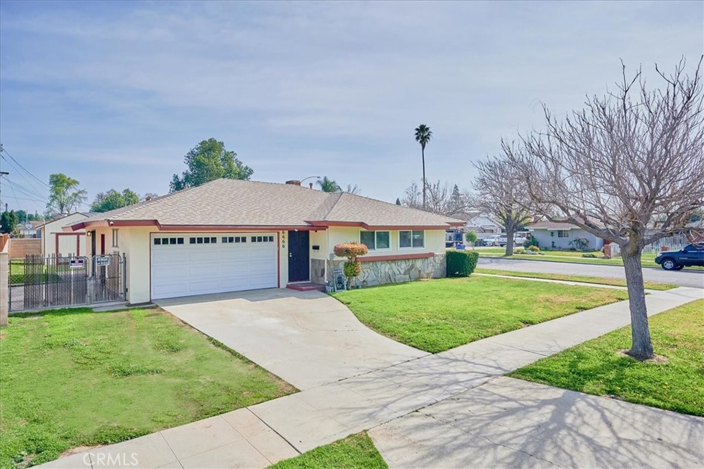 6666 Eva Place Riverside, CA 92504 - Photo 1 of 1 a front view of a house with yard
