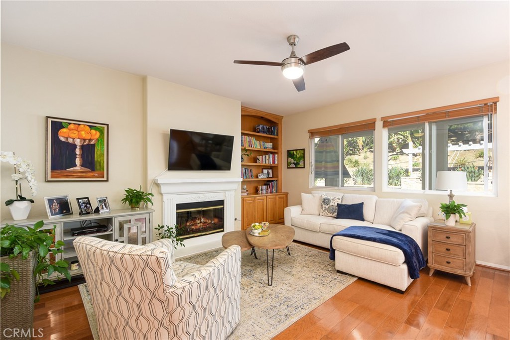 41686 Monterey Place Temecula, CA 92591 - Photo 11 of 51 a living room with furniture fireplace and a flat screen tv