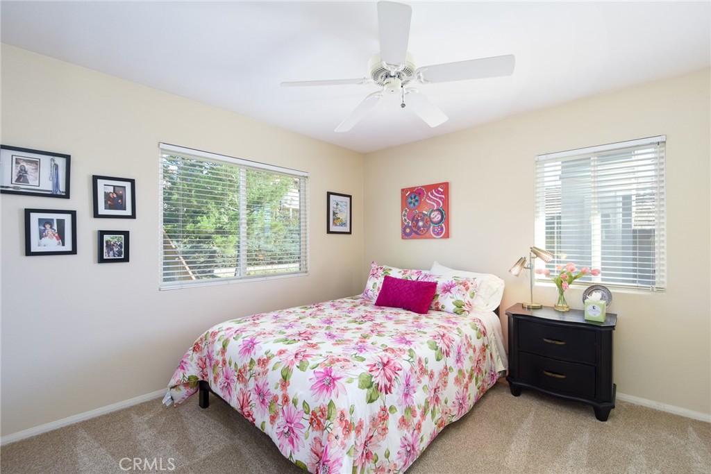 41686 Monterey Place Temecula, CA 92591 - Photo 30 of 51 a bedroom with a bed and a window