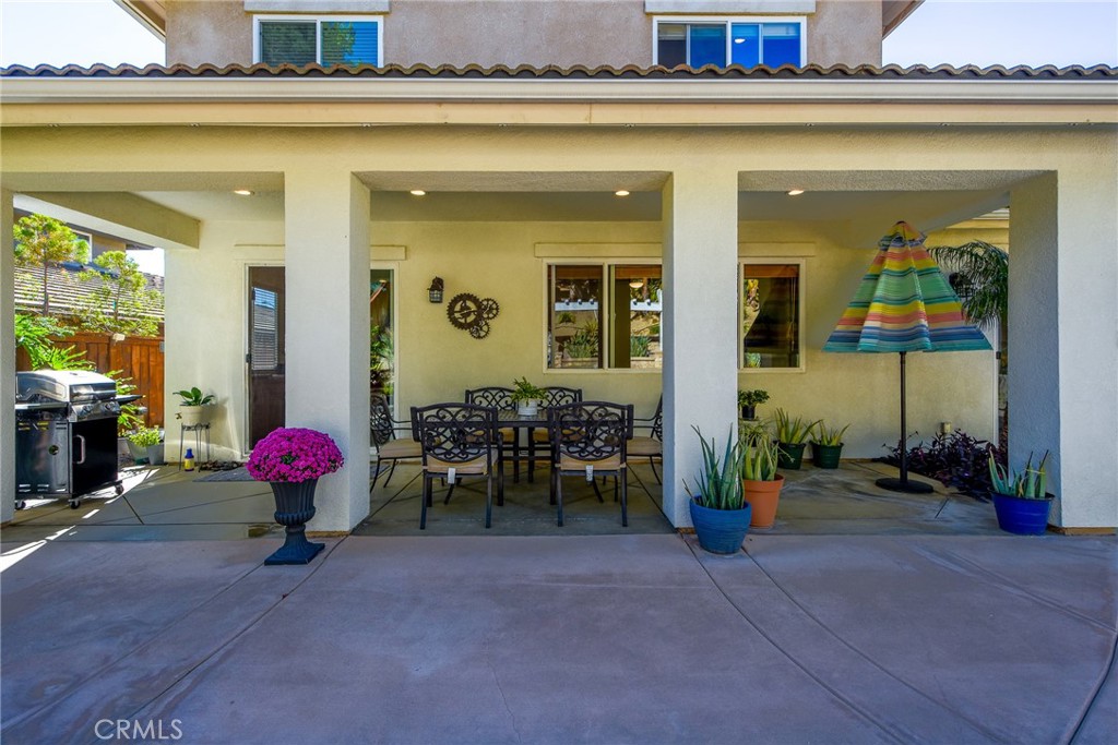 41686 Monterey Place Temecula, CA 92591 - Photo 42 of 51 a group of people sitting in front of a building