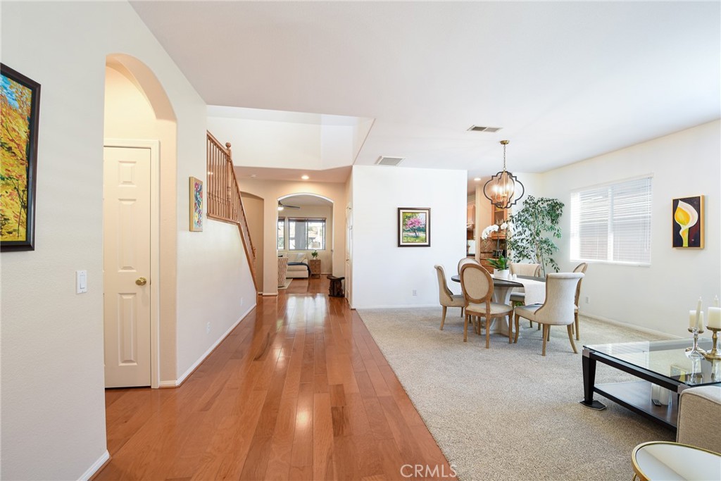 41686 Monterey Place Temecula, CA 92591 - Photo 5 of 51 a living room with furniture and a table