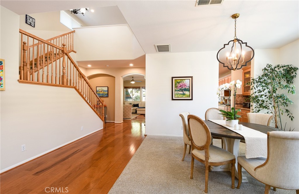 41686 Monterey Place Temecula, CA 92591 - Photo 9 of 51 a view of a livingroom with furniture stairs and a chandelier