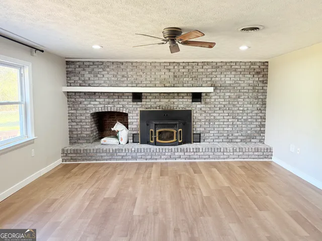 a living room with a fireplace