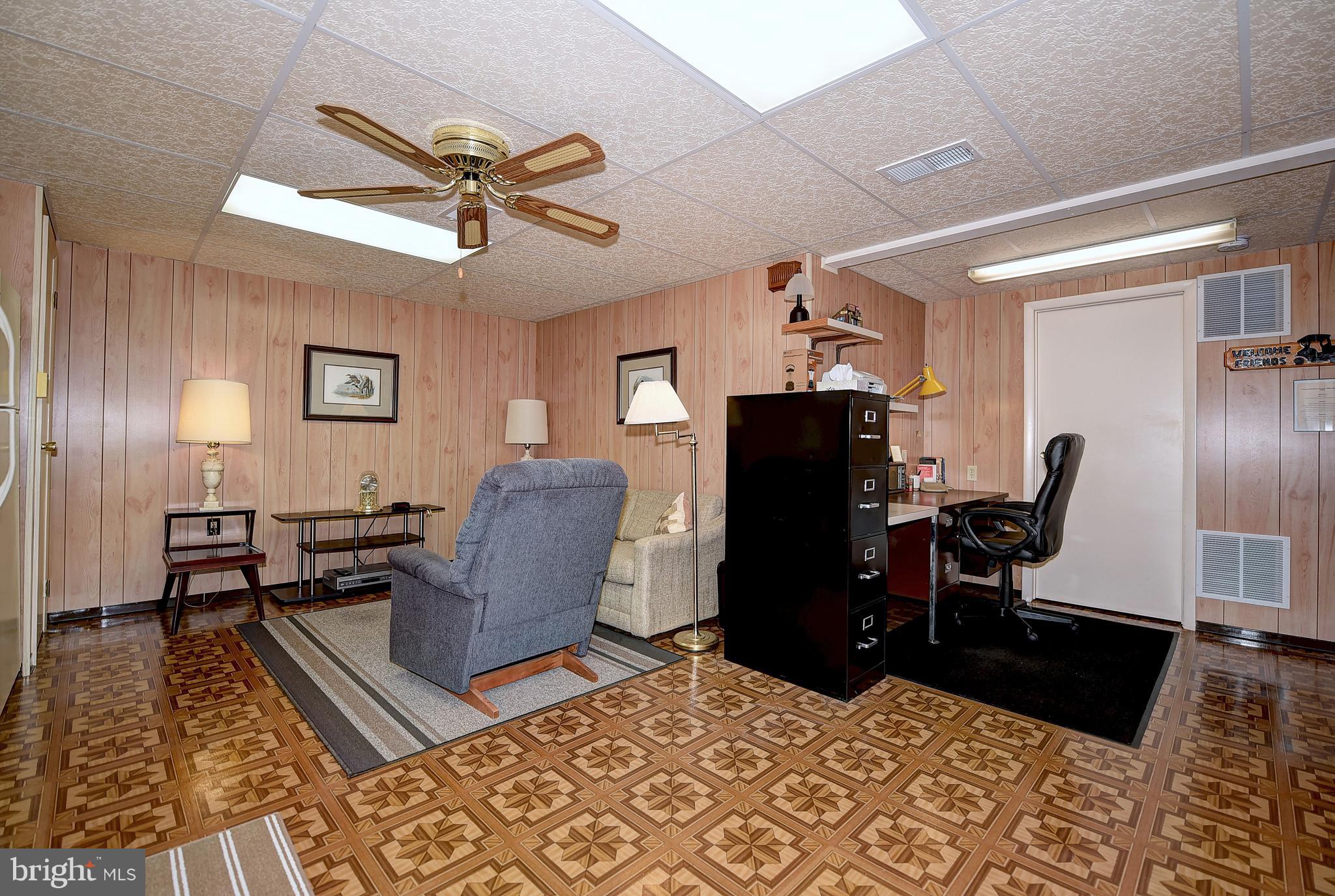 2505 Perring Woods Road Baltimore, MD 21234 - Photo 33 of 44 Basement "L" shaped Bonus Room w/ ceiling fan