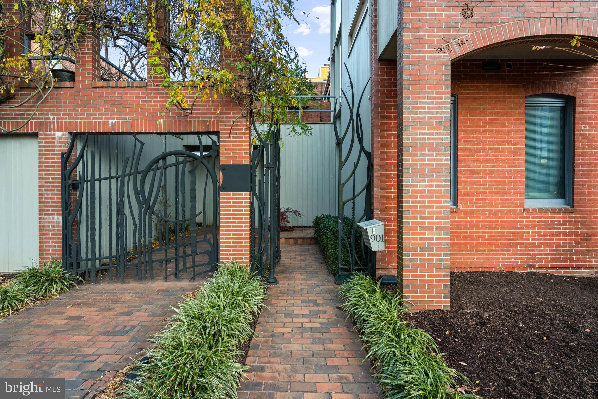 901 26th Street Northwest Washington, DC 20037 - Photo 2 of 32 a view of a pathway with a house