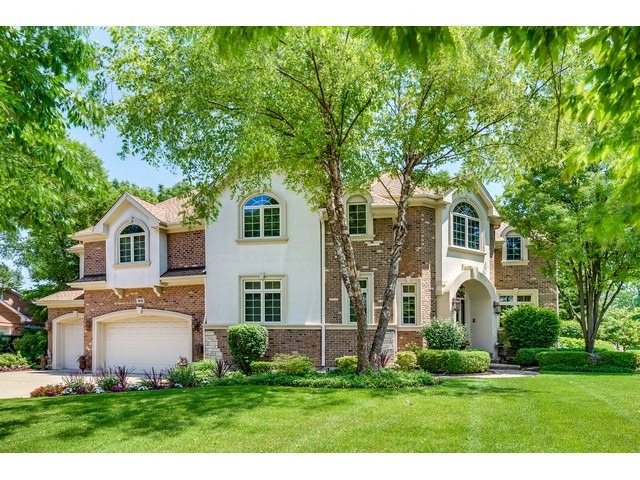 1415 Tyrell Avenue Park Ridge, IL 60068 - Photo 3 of 25 a front view of a house with a yard and garage