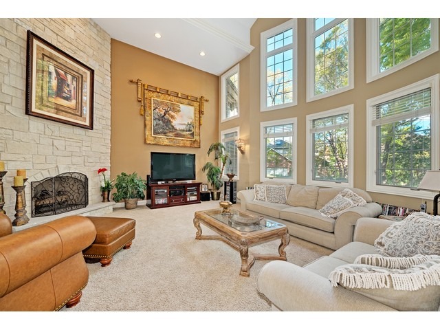 1415 Tyrell Avenue Park Ridge, IL 60068 - Photo 5 of 25 a living room with furniture large window and flat screen tv