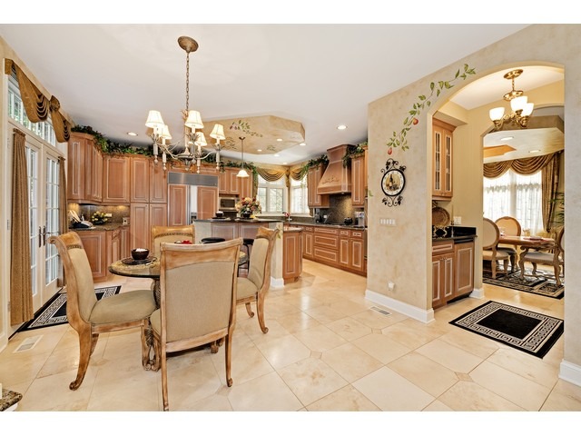 1415 Tyrell Avenue Park Ridge, IL 60068 - Photo 8 of 25 a view of a living room and kitchen