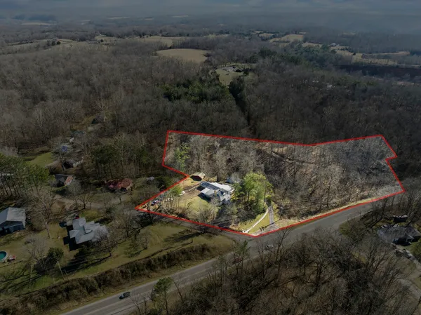 an aerial view of house with outdoor space
