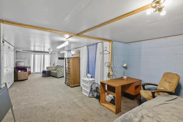 a view of yard with wooden fence