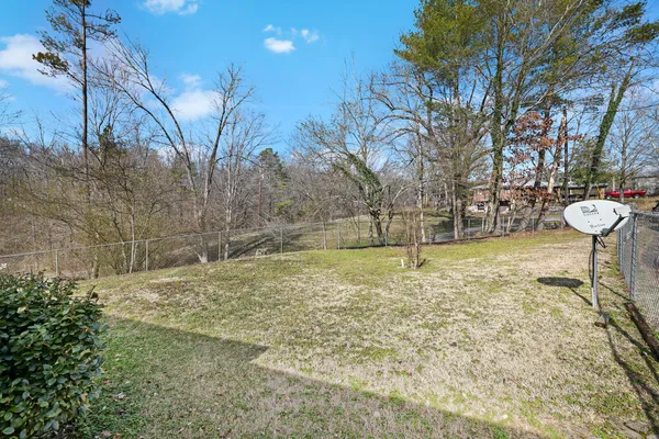 a view of swimming pool from a lake view