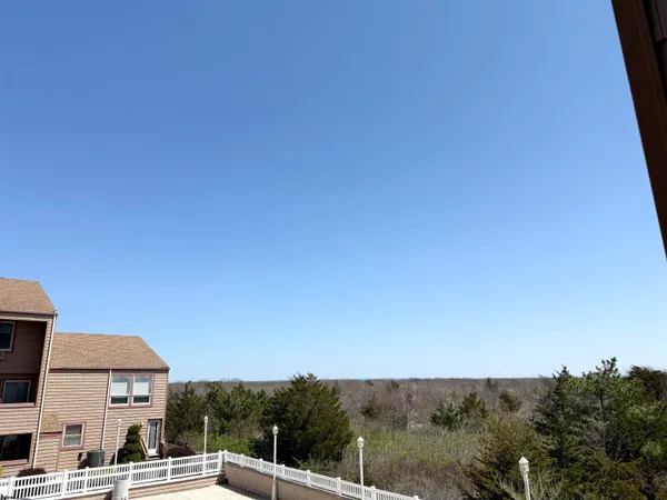 a view of swimming pool from a balcony