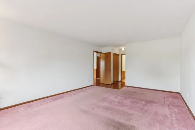 an empty room with an entryway