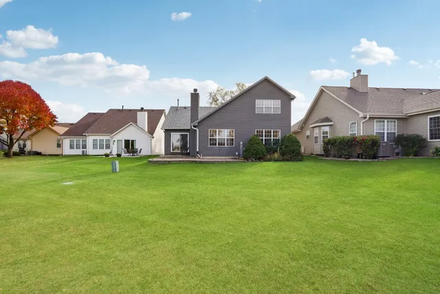 a view of a house with a big yard