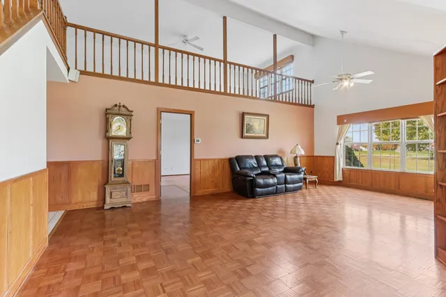 a view of livingroom with furniture and window
