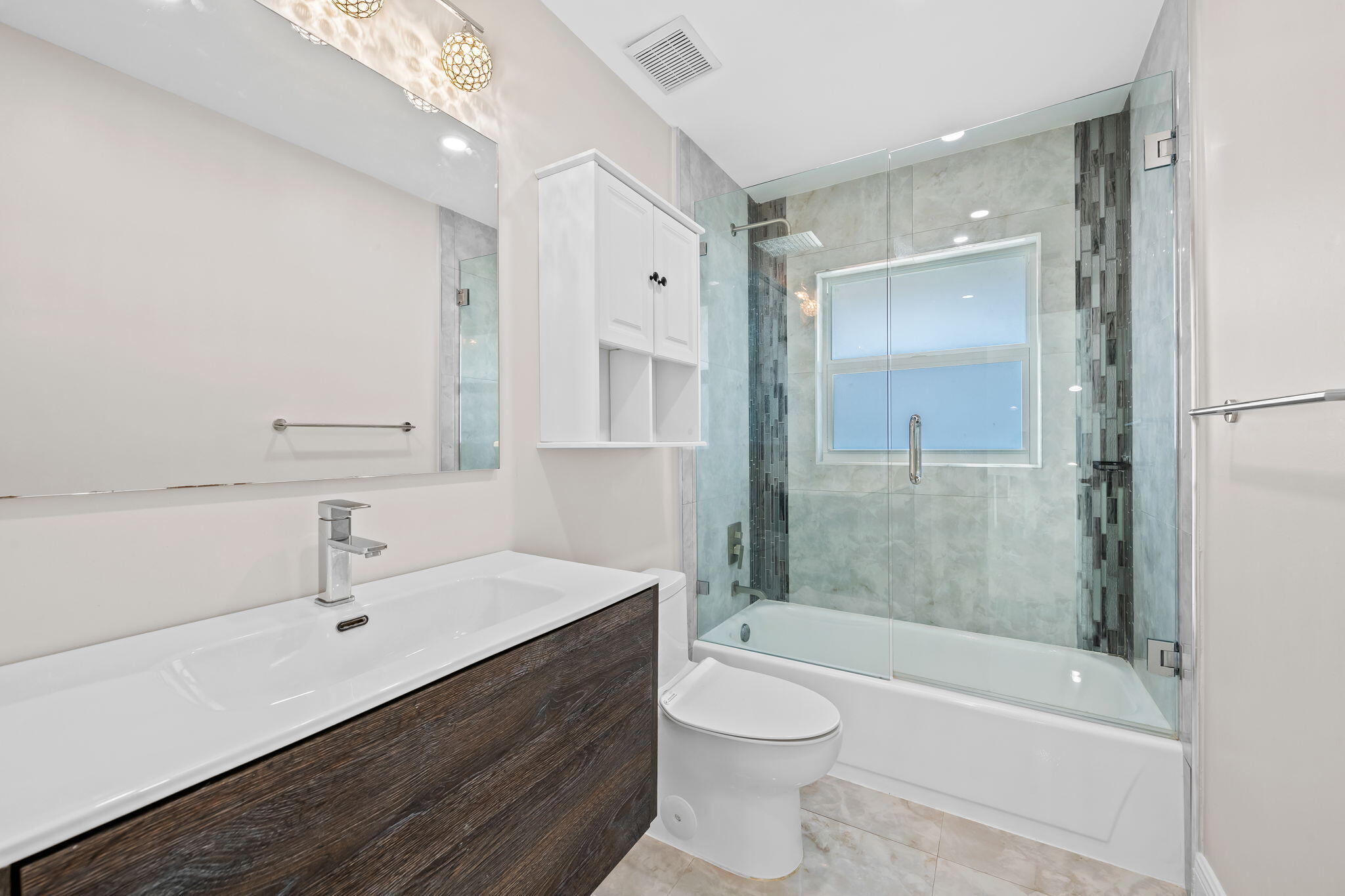 23162 L'Ermitage Circle Boca Raton, FL 33433 - Photo 26 of 48 a bathroom with a sink a toilet and shower