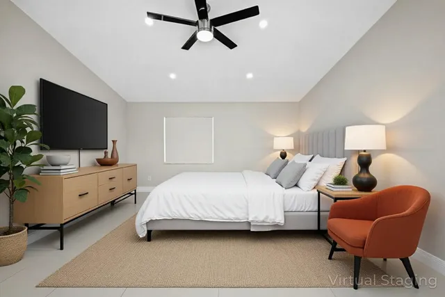 a front view of a house with a garden and yard