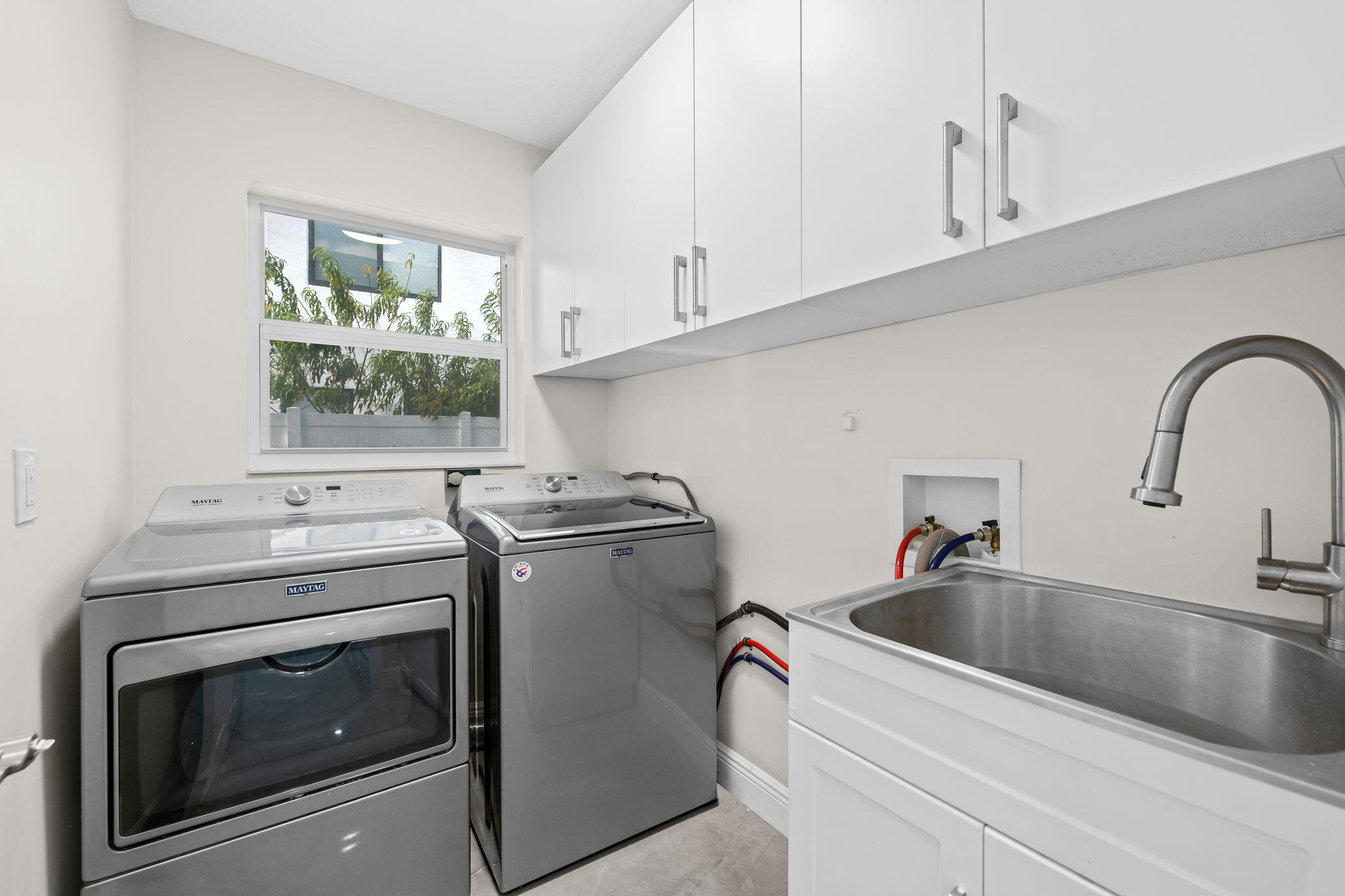 23162 L'Ermitage Circle Boca Raton, FL 33433 - Photo 34 of 48 a utility room with dryer and washer