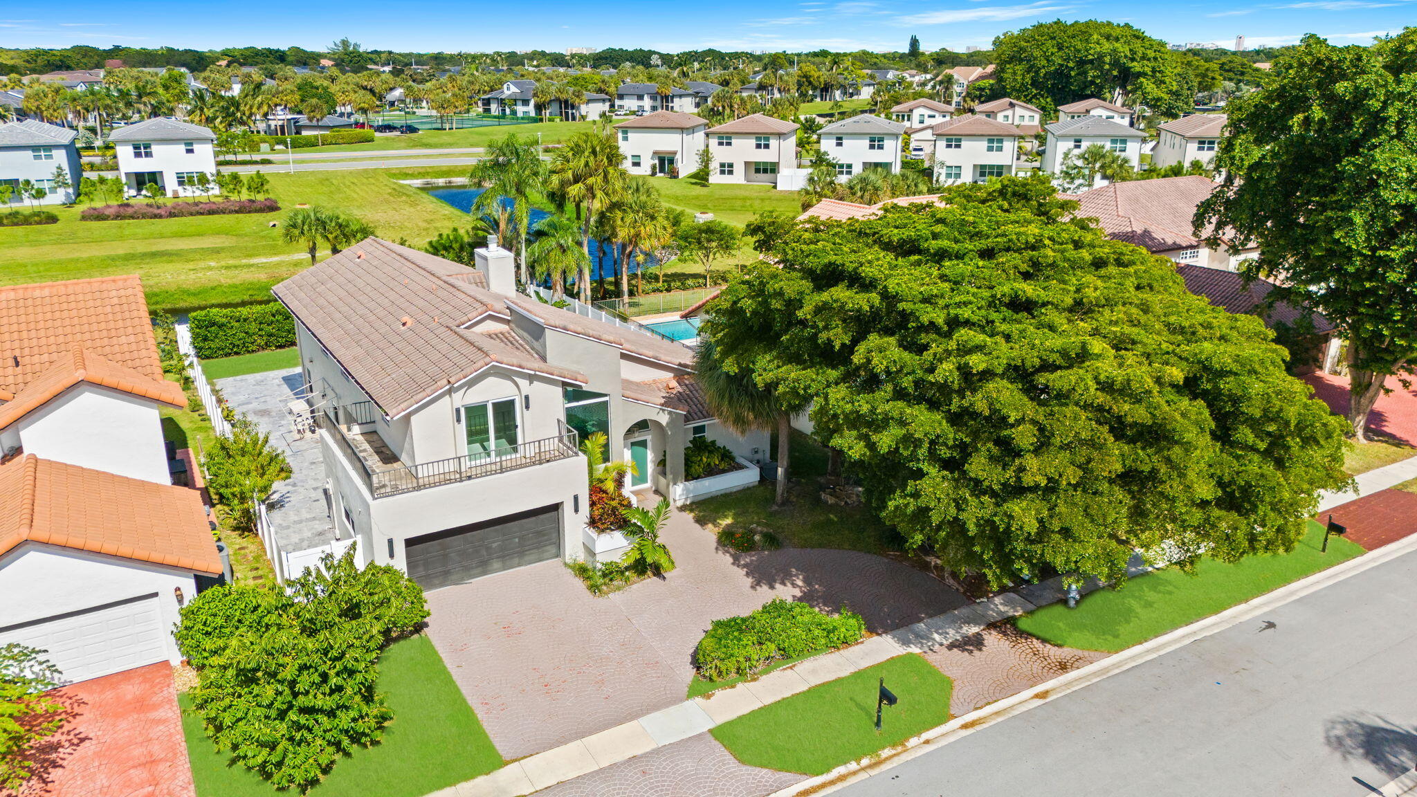 23162 L'Ermitage Circle Boca Raton, FL 33433 - Photo 44 of 48 an aerial view of a house with a garden view