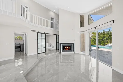 a view of an entryway with a fireplace