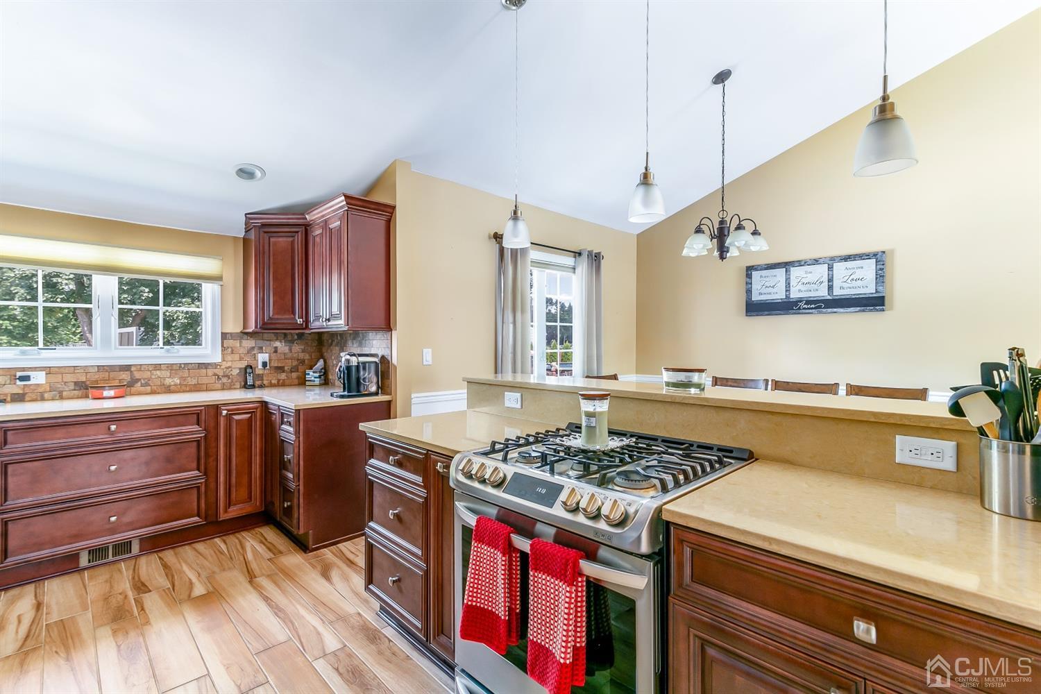 44 Gramercy Road Old Bridge, NJ 08857 - Photo 16 of 27 a kitchen that has a lot of cabinets in it