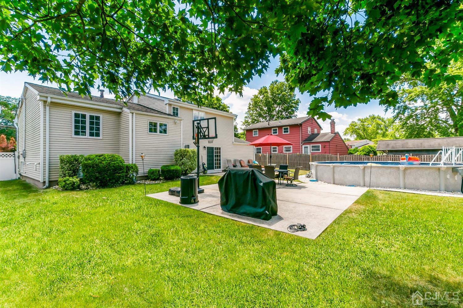 44 Gramercy Road Old Bridge, NJ 08857 - Photo 23 of 27 a view of backyard of house with green space