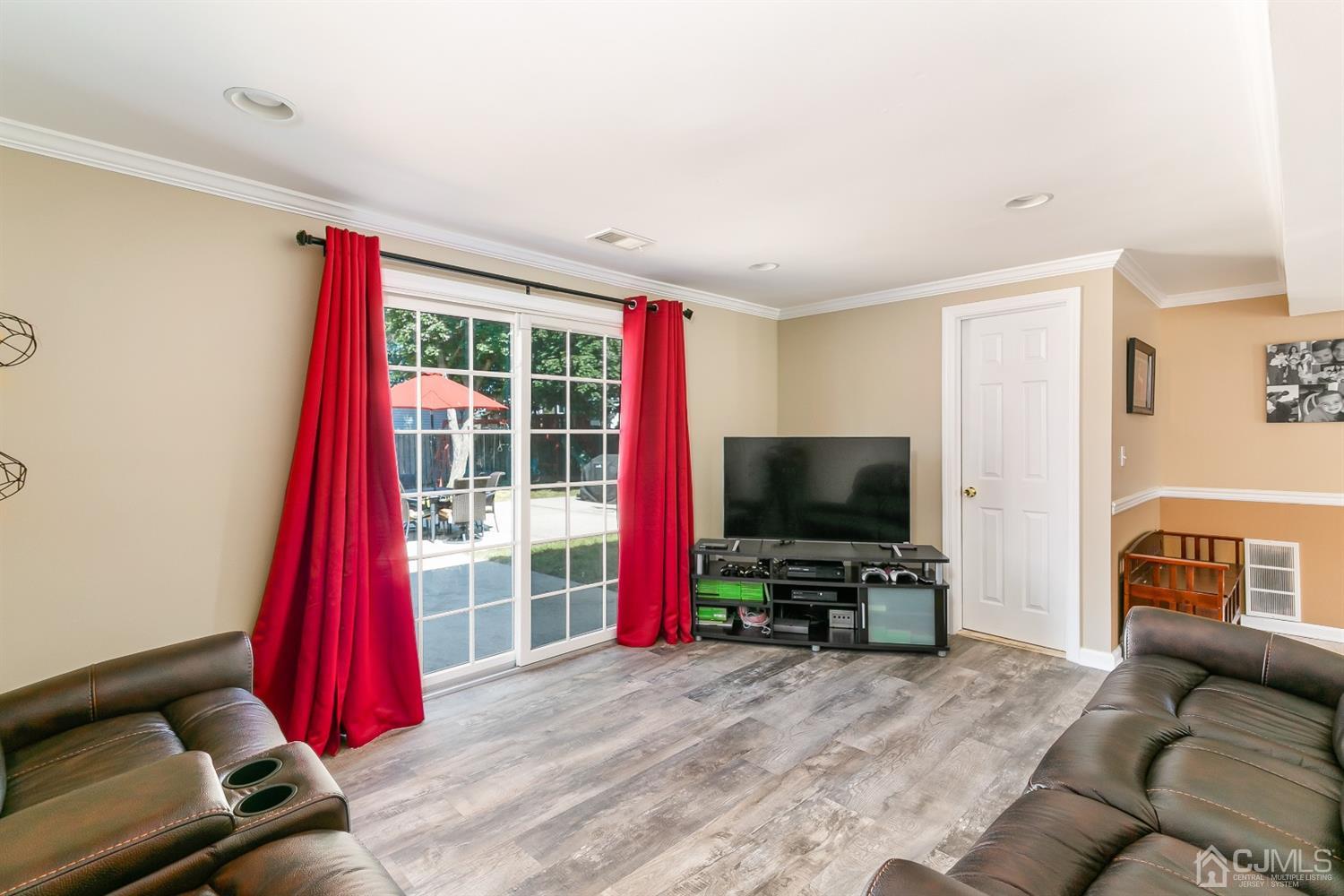44 Gramercy Road Old Bridge, NJ 08857 - Photo 6 of 27 a living room with furniture and a flat screen tv