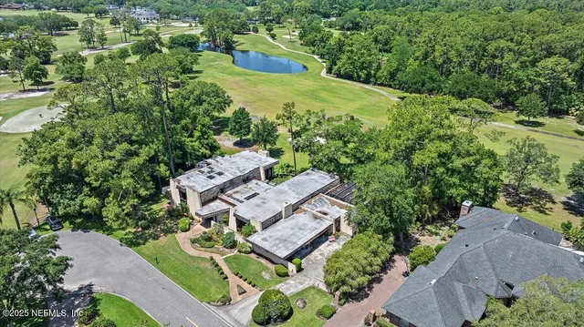a view of empty room with window and fireplace
