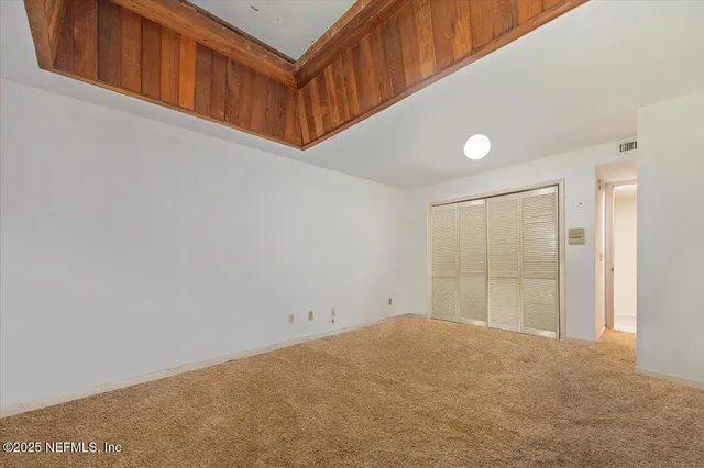 a view of a storage room with furniture