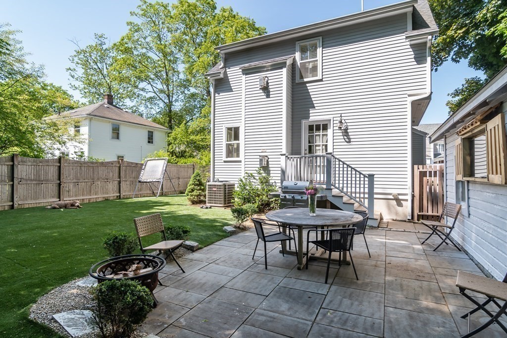 3 Claflin Road Wellesley, MA 02482 - Photo 17 of 20 a view of a house with backyard sitting area and garden