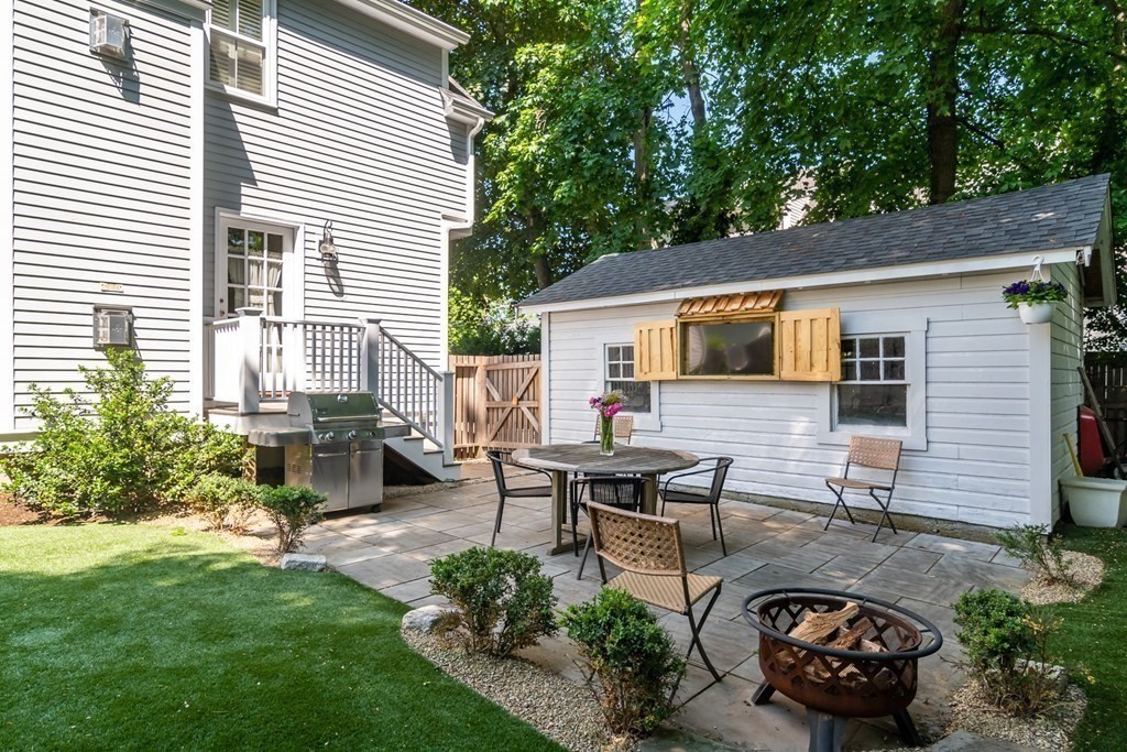 3 Claflin Road Wellesley, MA 02482 - Photo 18 of 20 a view of a backyard with sitting area