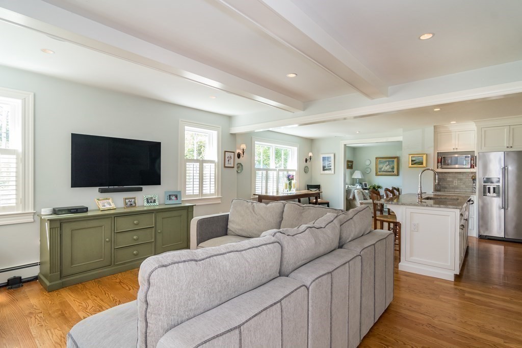 3 Claflin Road Wellesley, MA 02482 - Photo 10 of 20 a living room with furniture and a flat screen tv