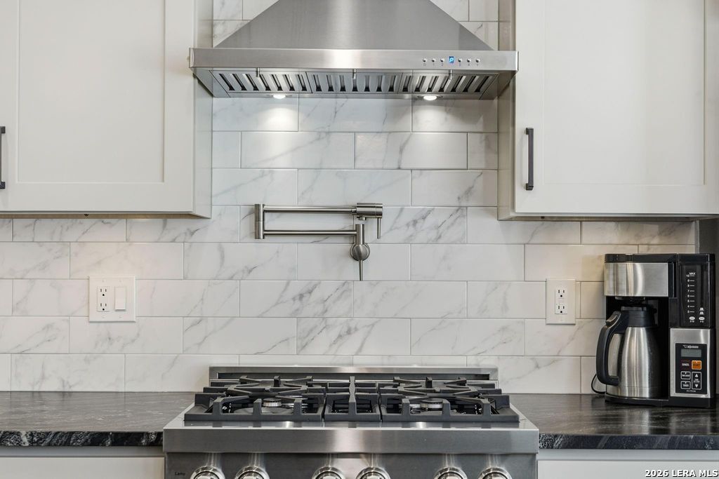 318 River Ridge Boerne, TX 78006 - Photo 15 of 46 a stove top oven sitting inside of a kitchen