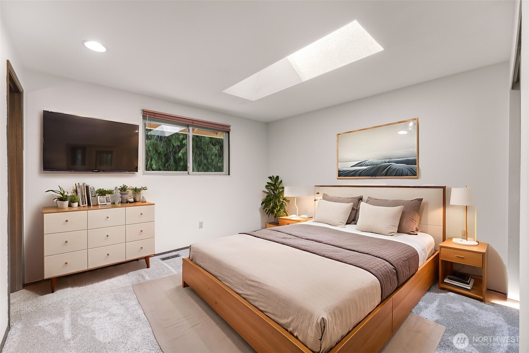 5925 Longdin Road Ferndale, WA 98248 - Photo 16 of 28 a bedroom with a bed and a flat screen tv