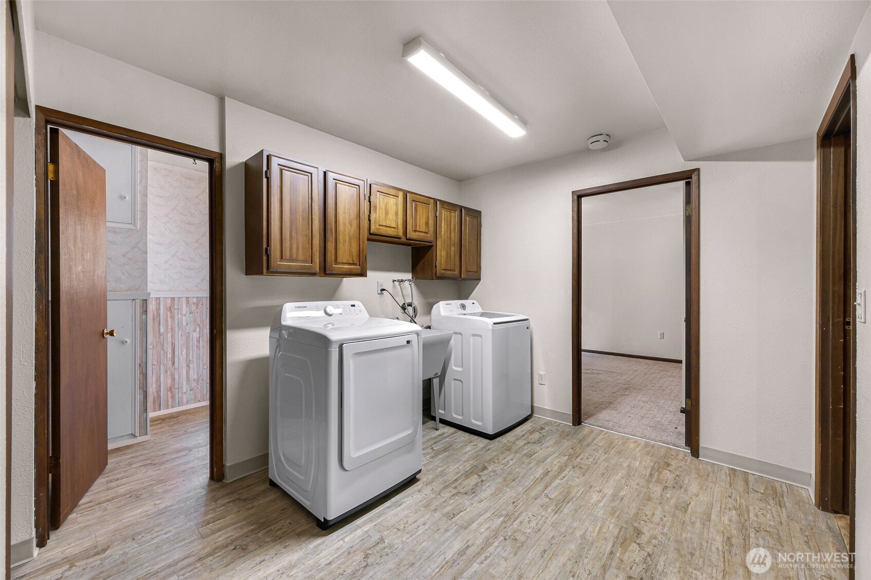 5925 Longdin Road Ferndale, WA 98248 - Photo 23 of 28 a utility room with cabinets washer and dryer